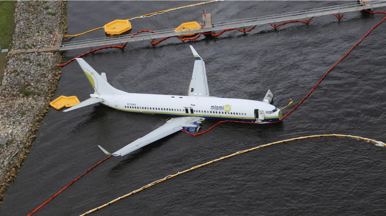 Image result for passenger plane skids into river